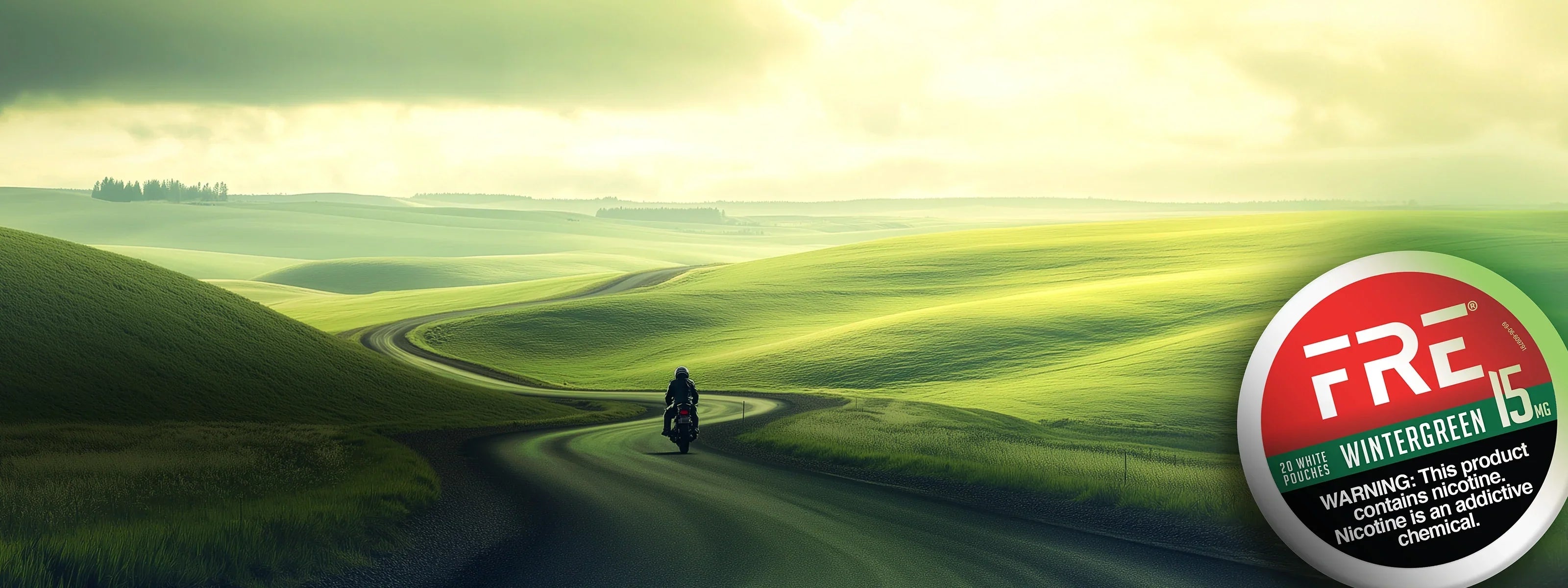 FRE Nicotine wjite pouches in Wintergreen with a winding, grassy road background