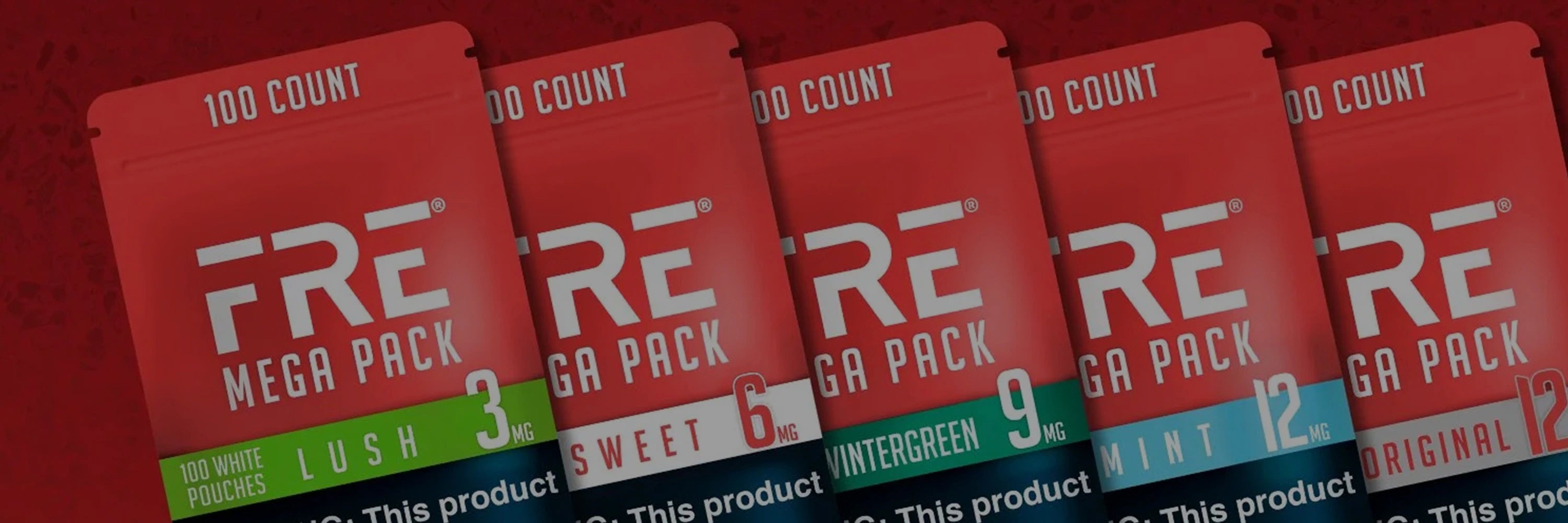 Diagonal lineup of FRE Mega Pack nicotine pouches in Lush 3mg, Sweet 6mg, Wintergreen 9mg, Mint 12mg, and Original 12mg varieties, displayed against a bold red background.