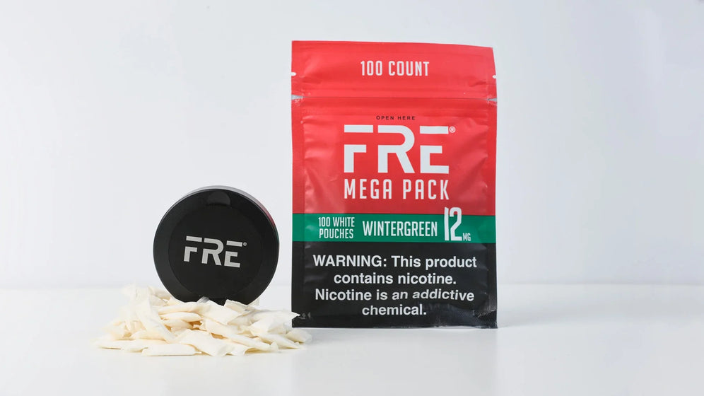 FRE Black Prmium travel tin and 12mg Wintergreen Mega Pack