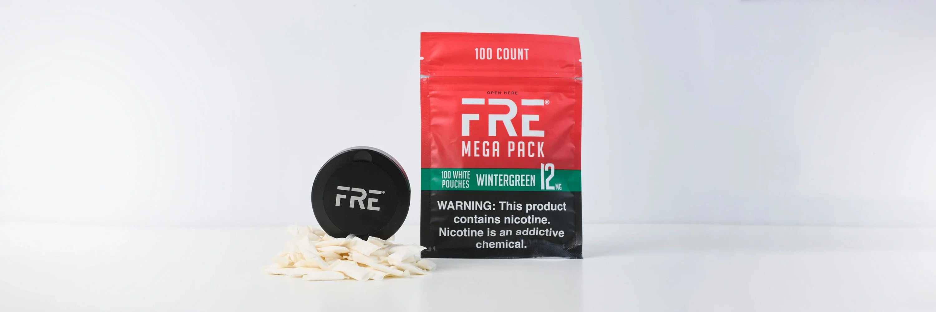 FRE Black Prmium travel tin and 12mg Wintergreen Mega Pack