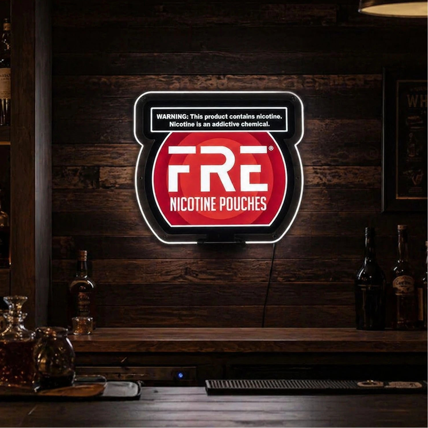 FRE nicotine pouches sign on a wooden bar background